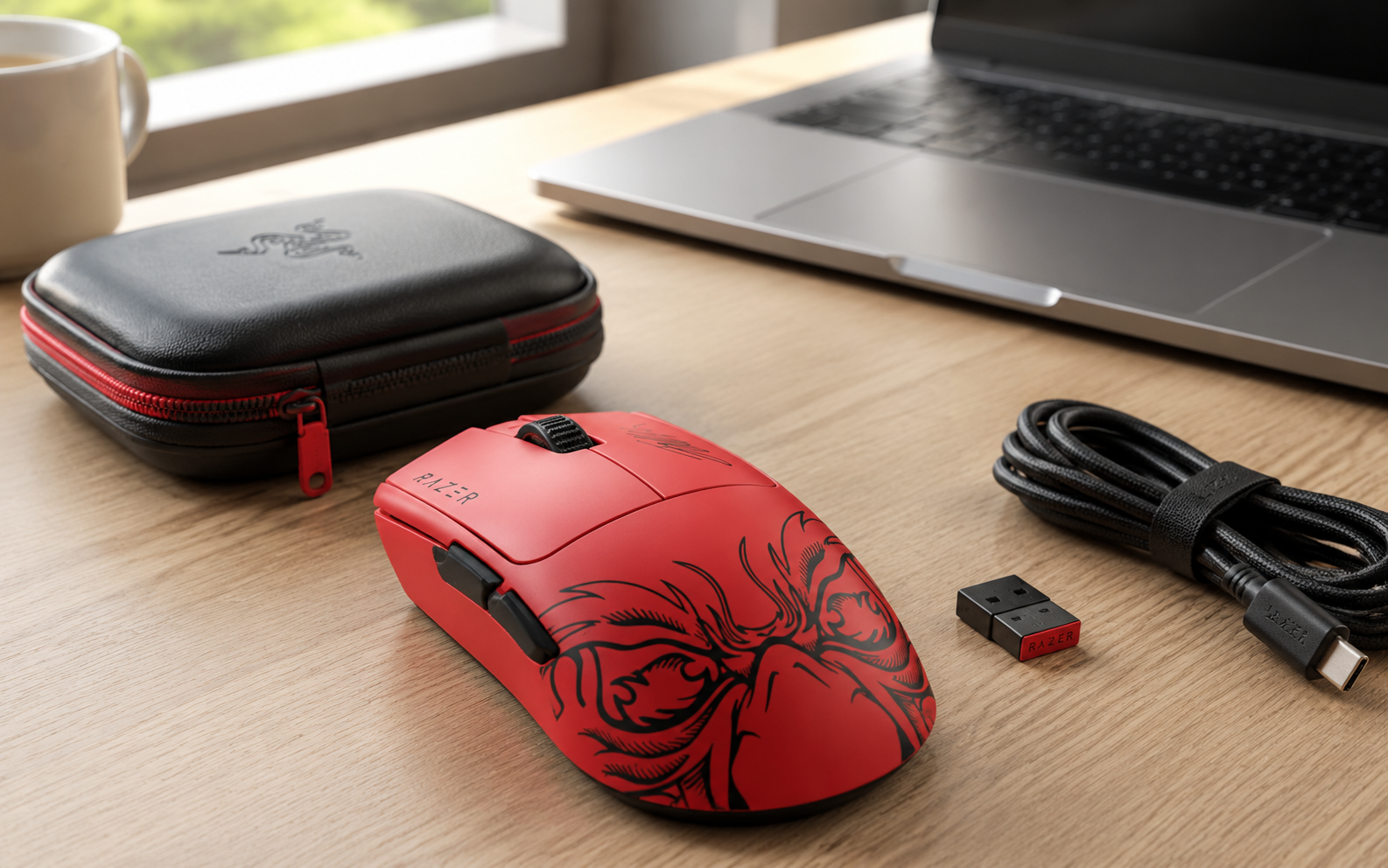 Red esports gaming mouse with laptop, protective case, receiver and USB-C cable